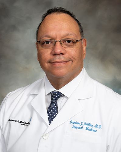 Damian J Collins MD